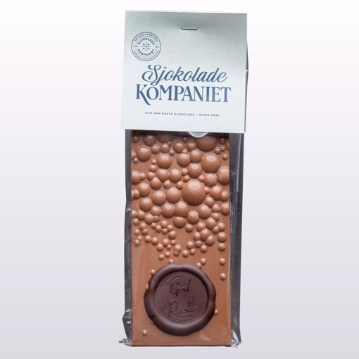 Bilde av Påskecrunch-sjokoladeplate – en sprø og smakfull blanding av melkesjokolade, karamellsjokolade og sprøstekt pannekake, perfekt for påsketuren.