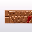 Bilde av "Thank You"-sjokoladeplate fra Sjokoladekompaniet, laget med fyldig melkesjokolade og søt karamellsjokolade. Sjokoladen har "Thank You" preget på overflaten, en elegant og smakfull gave for å vise takknemlighet.
