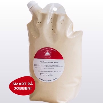 Bilde av fersk vaffelrøre i praktisk pose, klar til å stekes for sprø og smakfulle vafler.