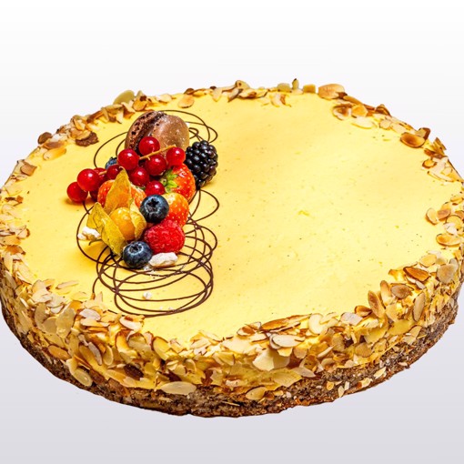 Bilde av Suksessterte 16 biter – en glutenfri klassiker med mandelbunn og fyldig eggekrem.