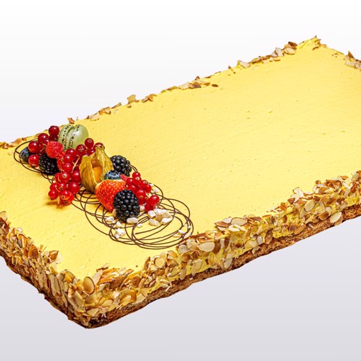 Bilde av Suksessterte 40 biter – en glutenfri klassiker med mandelbunn og fyldig eggekrem.