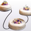 Bilde 3 av Bryllupskake – en vakker bryllupskake med flere lag og elegant dekor.