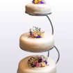 Bilde 6 av Bryllupskake – en vakker bryllupskake med flere lag og elegant dekor.