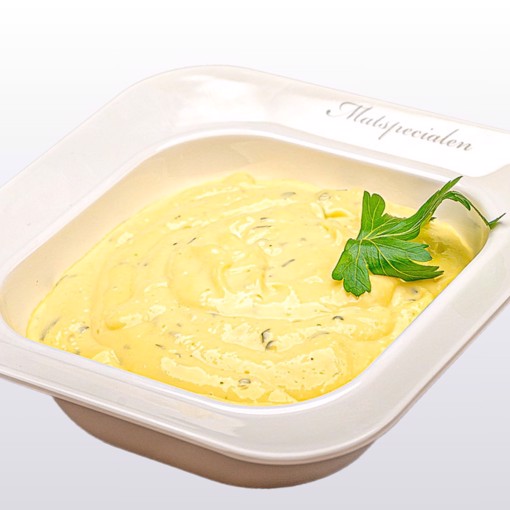 Bilde av kremet og smakfull aioli med et hint av hvitløk, perfekt som dip til brød, grønnsaker, fisk eller kjøtt. Et uunnværlig tilbehør til tapasbuffeten.