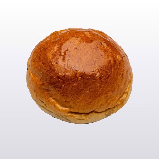 Bilde av nystekte Hveteboller med gyllen skorpe og luftig konsistens, perfekte til kaffepausen.