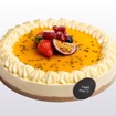 Bilde av Pasjonsfrukt Ostekake – en silkemyk ostekake med pasjonsfrukt.