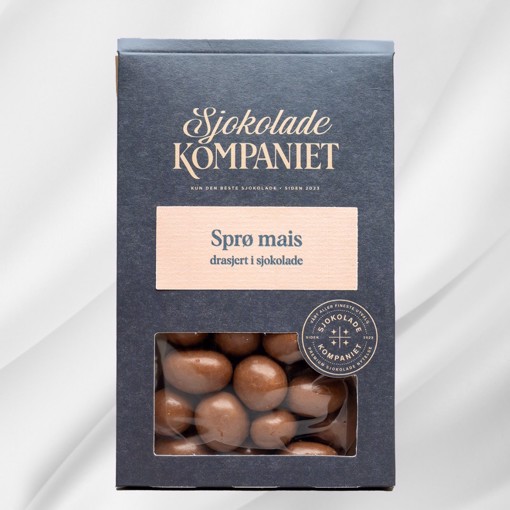 Bilde av Drasjerte Mais fra Sjokoladekompaniet – sprø, puffet mais overtrukket med sjokolade og en delikat glans. En perfekt balanse mellom søtt, salt og crunchy tekstur, ideell som en smakfull snack eller gave.
